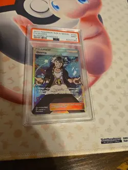 Pokemon Guzma Burning Shadows Full Art #143 PSA 9 Mint - Image 1