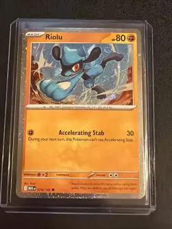 Pokemon TCG Riolu 076/132 Mega Evolutions Cosmos Holo with SWIRL - NM - Image 1