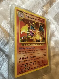 2016 Pokemon TCG: XY Evolutions Charizard Holofoil card (card number 11/108) - Image 1