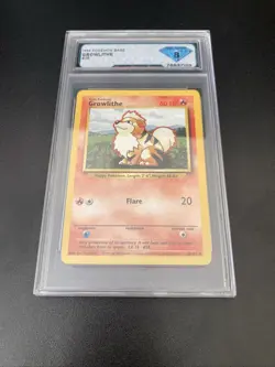 1999 Pokemon Base Set Growthlithe #28 Graded 8 NM/Mint - Image 1