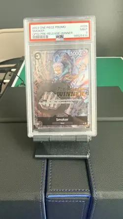 2023 ONE PIECE PROMOS PARAMOUNT WAR PRE-RELEASE-WINNER #025 SMOKER PSA 9 - Image 1