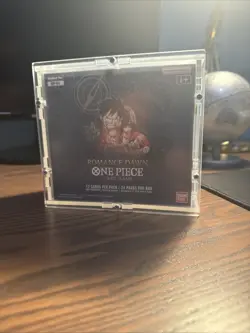 Box One Piece Card OP-01 Romance Dawn BLUE BOTTOM FIRST WAVE eng+ Acrylic Case - Image 1