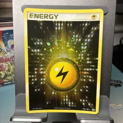Lightning Energy 104/106 Rare Holo SWIRL Pokemon card Emerald - Image 1
