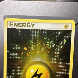 Lightning Energy 104/106 Rare Holo SWIRL Pokemon card Emerald - Image 2