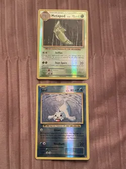 2x Reverse Holo Pokemon Cards - Seel 28/108 - Metapod 4/108 - Evolutions [MP] - Image 1