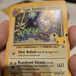 Light Toxtricity Pokemon SWSH137 Black Star Promo Holo with HD Swirl - Image 2