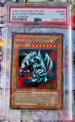 PSA 7 YuGiOh Blue-Eyes Toon Dragon MRL-E000 1st Edition Secret Rare Europe - Image 1