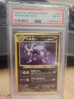 2000 POKEMON JPN NEO 2 #229 HOUNDOOM-HOLO PSA 8 - Image 1