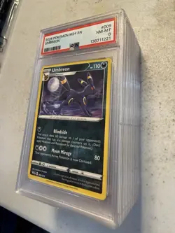2025 Umbreon PSA 8 M24 EN-MCDONALD'S COLLECTION #009 Pokemon Card - Image 1