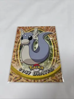 2000 Topps Pokemon Series 3 #147 Dratini Blue Logo 1st Edition TV Animation - Image 1