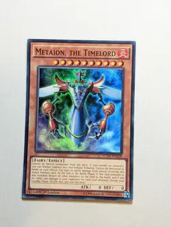 YuGiOh TCG Card Metaion, the Timelord LC5D-EN228 Super Rare 1st Edition - MP - Image 1