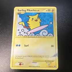 2009 Pokemon Rising Rivals Surfing Pikachu 114/111 Secret Rare Holo Card HP - Image 1