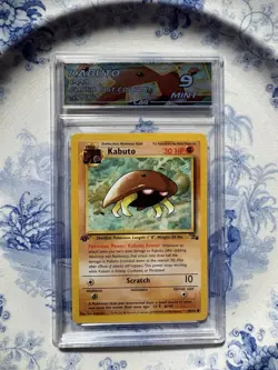 Pokemon Kabuto Fossil 1st Edition 1999 CAG 9 Graded Card 50/62 English - Image 1