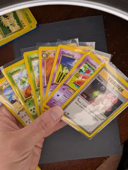Lot Of 7 Vintage Pokemon Cards - Neo Genesis 1st Ed Non Holo - Image 1