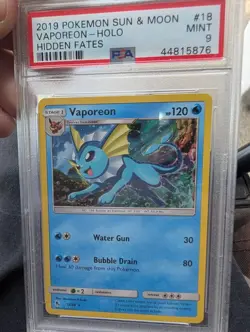2019 Pokemon Sun & Moon Hidden Fates Vaporeon-Holo #18 PSA 9 Mint - Image 1