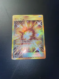 Pokemon Sun & Moon Beast Ring Trainer Secret Rare Gold 141/131 NM - Image 2