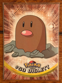1999 Topps Pokemon Diglett #50 TV Animation Edition Blue Logo Non Holo 1st Print - Image 1