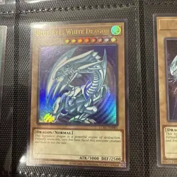 Blue-Eyes White Dragon LCKC-EN001 (Version 2) Ultra Rare Yugioh SDK Art - Image 1