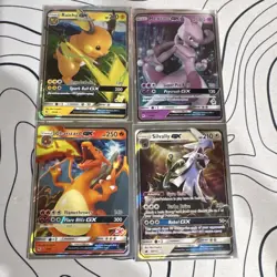 Pokemon TCG Sun & Moon GX Holo Card Lot Raichu Mewtwo Charizard Silvally 4 Cards - Image 1