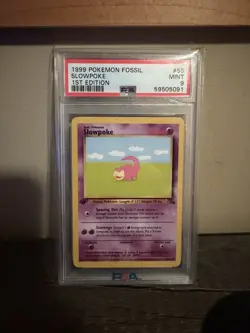 1999 Pokemon Fossil Slowpoke 1st Edition #55 PSA 9 - Image 1