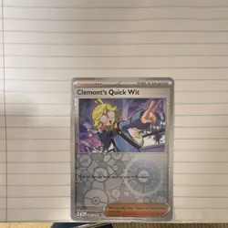 Pokemon Clemont's Quick Wit 167/191 Sv08: Surging Sparks Reverse Holo Uncommon - Image 1