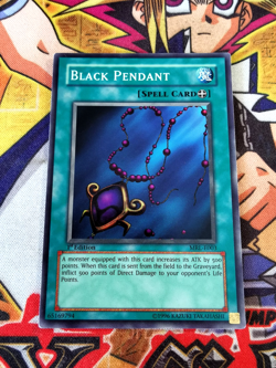 Black Pendant mrl-e003 1st Edition (MP) Super Rare Yu-Gi-Oh! - Image 1
