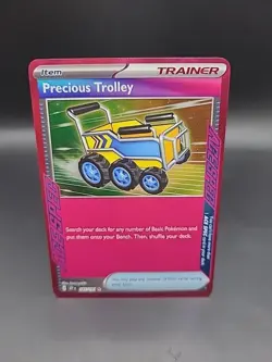 Pokemon TCG Surging Sparks Precious Trolley 185/191 ACE Spec Trainer Card - Image 1