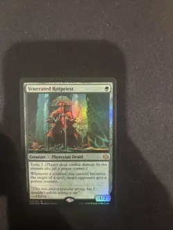 Venerated Rotpriest Phyrexia: All Will Be One Prerelease Foil - Image 1