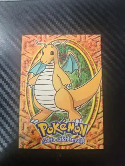 Dragonite Blue Logo E12 of E12 Pokemon Topps The First Movie - Image 1