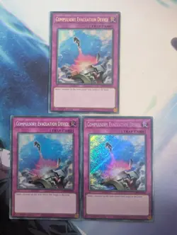 YuGiOh! Compulsory Evacuation Device RA01-EN069 Secret Rare x3 PLAYSET 1st Ed - Image 1