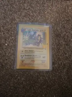 Light Toxtricity SWSH137 SWSH: Sword & Shield Promo Cards Holo - Image 1