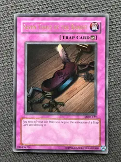 Yugioh Seven Tools of the Bandit Unlimited Edition Ultra Rare MRD-129 NM - Image 1