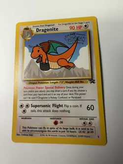 Dragonite #5 Black Star WB First Movie Promo 1999 WOTC Vintage Pokemon Card - Image 1