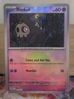 DUSKULL 035/131 COMMON PRISMATIC EVOLUTIONS POKEMON POKE BALL HOLO NM - Image 1