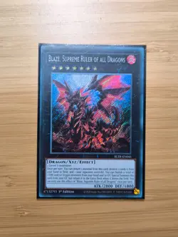 Blaze, Supreme Ruler of All Dragons (1st, Secret) - BLTR-EN045 - YuGiOh Card - Image 1