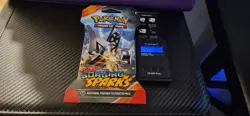 Very HEAVY!! - 31.68gram- Pokemon Surging Sparks Sleeved Booster Pack!! - Image 1