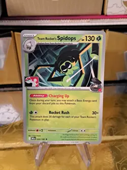 Team Rocket's Spidops Pokemon Prize Pack Series 8 Promo Pokemon Card NM/LP - Image 1