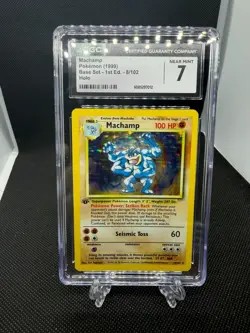 1999 Pokemon Base Set 1st Edition #8/102 Machamp Holo CGC 7 NM - Image 1