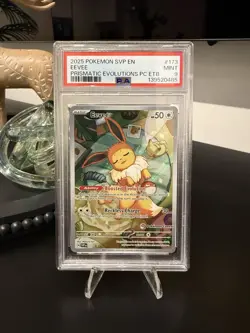 Pokemon TCG Prismatic Evolutions - SVP173 Eevee - Pokemon Center Stamped - PSA 9 - Image 1