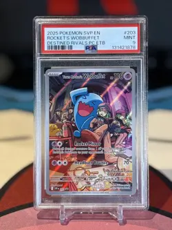 2025 POKEMON DESTINED RIVALS POKEMON CENTER ETB TEAM ROCKET'S WOBBUFFET PSA 9 - Image 1