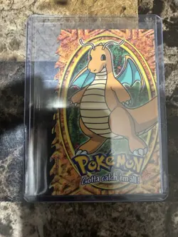 1999 Topps Pokemon the First Movie Dragonite E12 of 12 Die-Cut - Image 1
