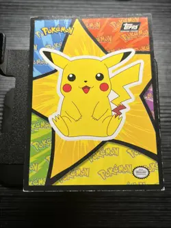 1999 Topps Sticker Pokemon Pikachu sitting puzzle piece blue logo vintage tcg - Image 1