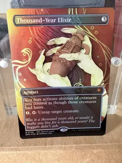 MTG Thousand-Year Elixir Borderless Foil NM Mythic Lorwyn Eclipsed - Image 1