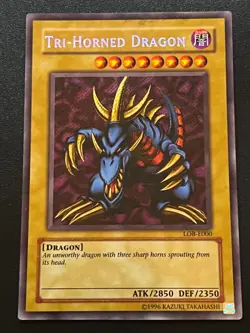 Tri-Horned Dragon LOB-E000 Secret Rare Unlimited Light Play+ Yugioh - Image 1