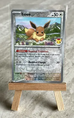 Pokemon TCG *SWIRL* Eevee 074/131 Pokemon Day 2025 Reverse Cosmos Holo -NM(-)/LP - Image 1