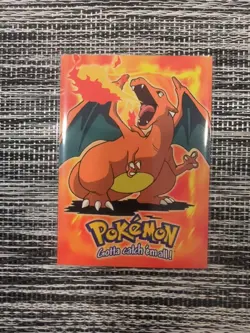 Charizard - 1999 Pokemon Topps the First Movie Charizard E6 CGC 7 - Image 1