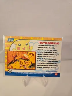1999 Topps Pokemon: The First Movie 51 Trapped Charizard Blue Logo First Edition - Image 2
