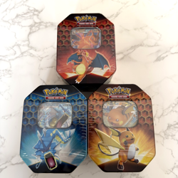 Pokemon Hidden Fates GX Tins Set of 3 - Charizard, Gyarados, Raichu | NEW SEALED - Image 1
