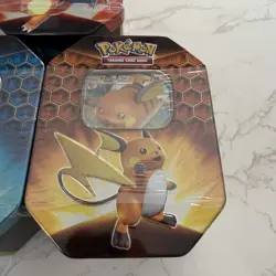 Pokemon Hidden Fates GX Tins Set of 3 - Charizard, Gyarados, Raichu | NEW SEALED - Image 4