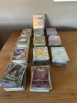 1000+ Pokemon Cards, 1x 9.5 Graded Slab, 2 tins, 4 folders Job lot bundle - Image 1